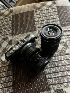 Olympus E-pl 3 with helios 44-2 and 40-150 lens