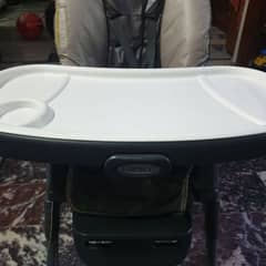Baby high chair by Graco baby food chair