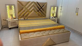 King bed with side table and moltyform mattress