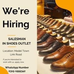 Salesman in Shoes Shop