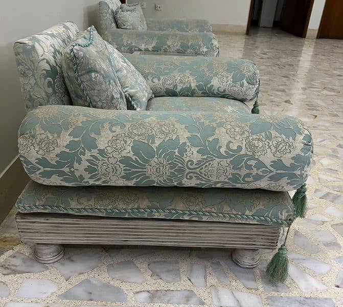 4 seater set. 
2 single. 
2 double seats  
Kalamkaar design  
65,000/- 1