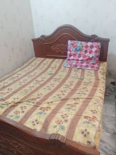 wooden double bed