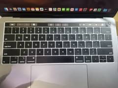 MacBook pro (13-inch 2019) with touch bar and finger print