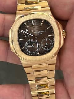 patek Phillips nautilus watch 18k yellow Gold and pocket watch antique