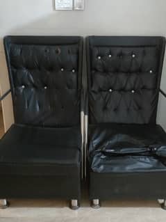 black leather sofa set with table