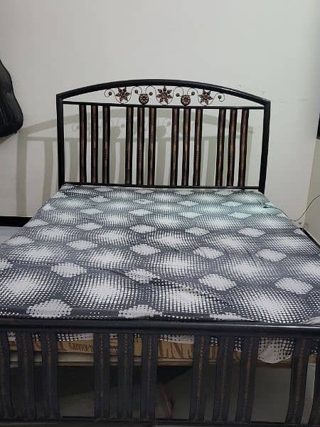 Used iron rod Queen Size Bed without mattress 1