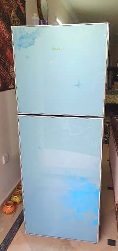 Haier glass door  fridge in Almost new condition