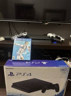 Playstation 4 with 2 controllers and fifa