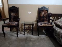 two chairs with table