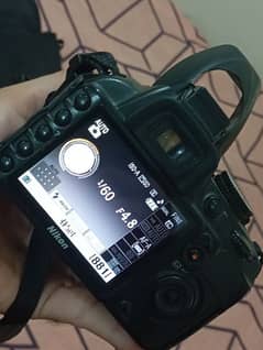 nikon D3100 DSLR camera with 18-55mm kit lens