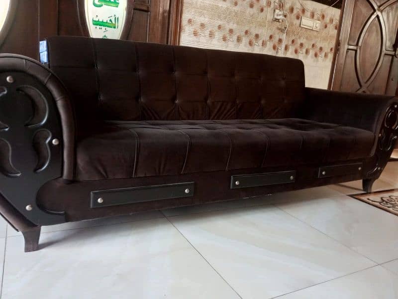 sofa cum bed in brown colour 2