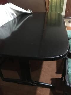 wooden table with 6 chairs