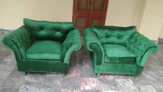 2 single seater tufted sofas