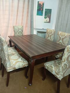 wooden dinning table with 6 chairs