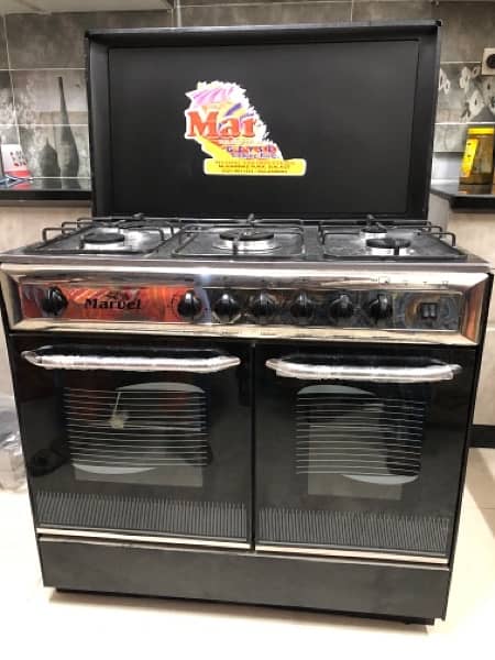 urgent sale  New cooking range 5 burners double door gas 2