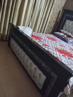 Double bed with mini tables