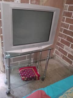 T. V for sale with trolley