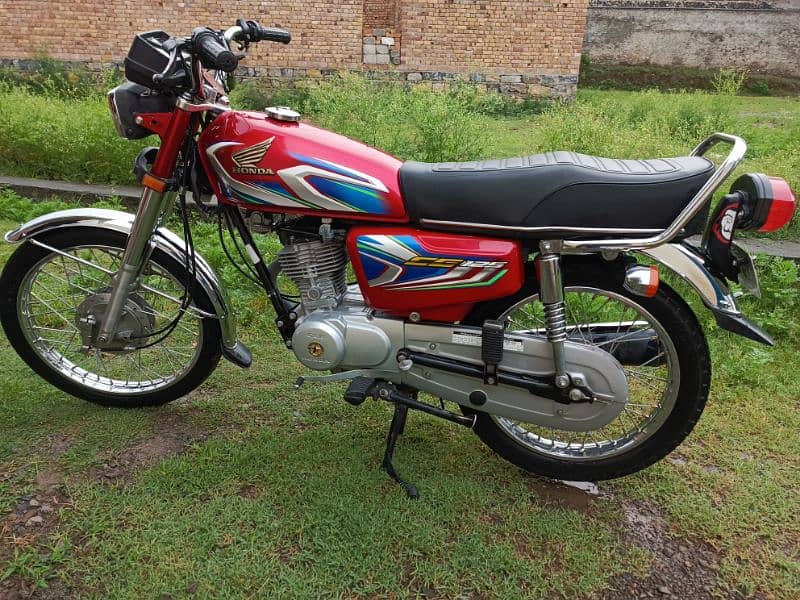 Honda 125 very good condition 9