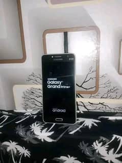 03237004371 Samsung Galaxy grand prime plus metallic black special edi