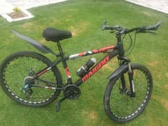 MAIGOO MOUNTAIN BIKE ONLY "ONE MONTH USED"