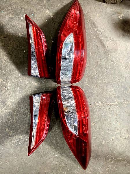 Toyota Yaris Geniune Head Lights and Back Lights available 2