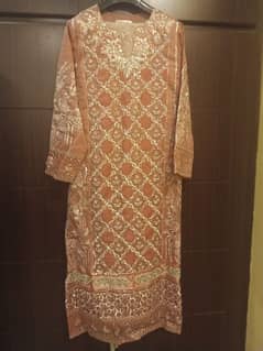 Medium sized pink dress (long shirt trouser and dupatta)