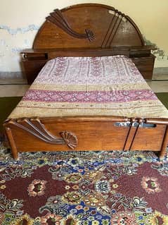 wooden double bed in good condition