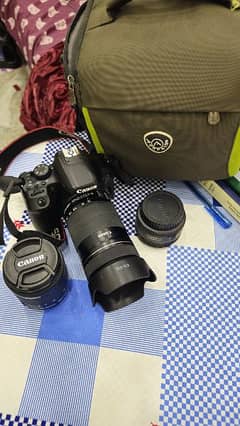 canon 850d with 55-250stm 50mm f1.8stm and 18-55stm and imported bag