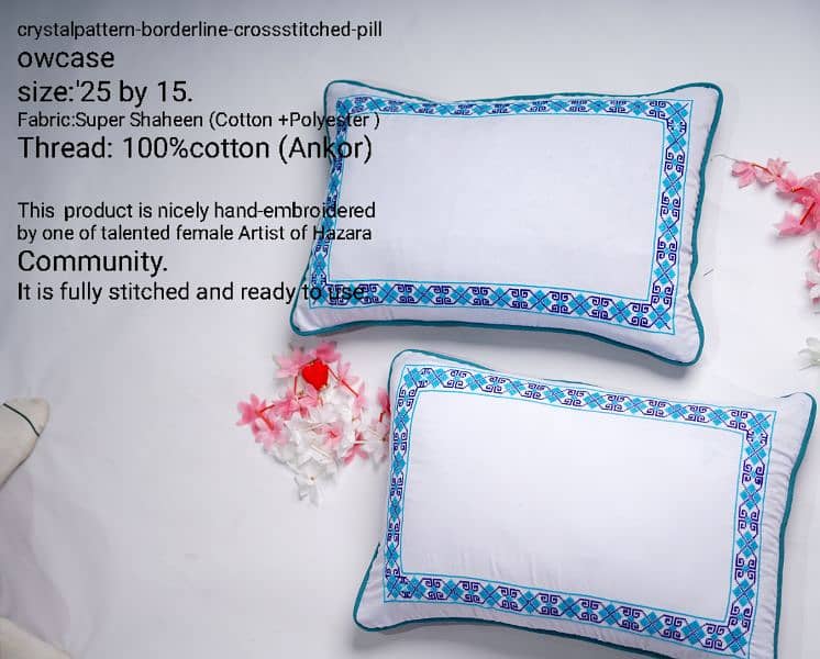 A pair of Borderline Cross-stitched pillowcases 2