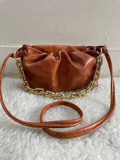 brown leather cross body and hand bag in an excellent condition