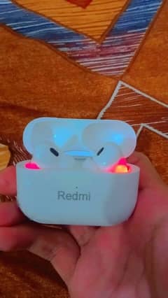 new Redmi earpuds with box and charge aik buds ki battery kharab hai