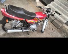 united 100 cc bike used like new peshawar number plate red colour very