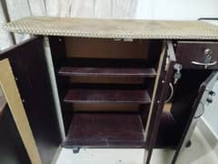 iron stand with storage cupboard