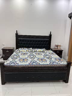 Bed with side tables