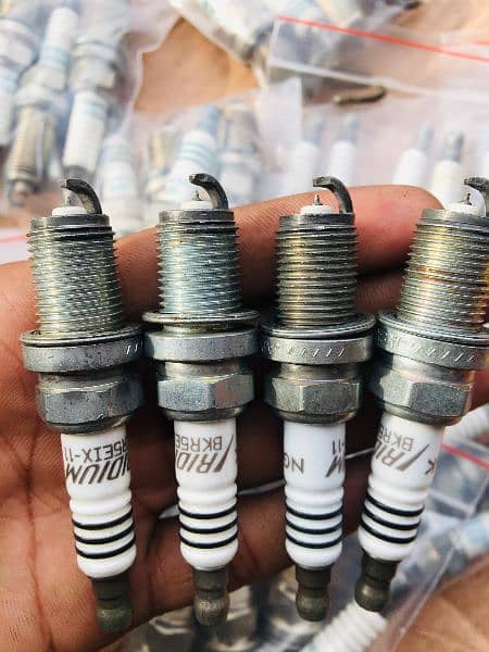 Suzuki swift ignition coils genuine with irridium plugs 8