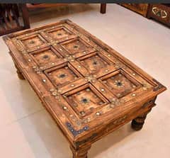 antique design wooden centre table. Swati.