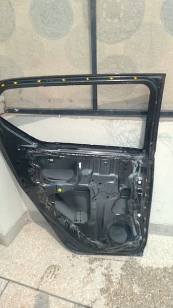 Mira Front Bumper and Left Back Door For Sale 1