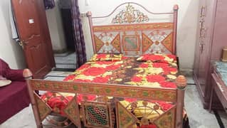 Double bed with 2 side tables and drassing table