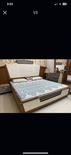 bedset along with dressing table