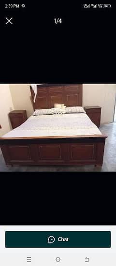 bed along with side tables and mattress