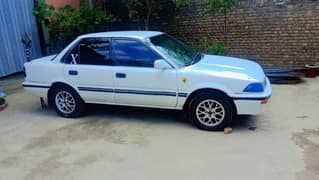 corolla 88 import 93 injan 16 valve AC chalo lahore numbr