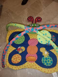 baby cloth bed in shape of butterfly and with her toys