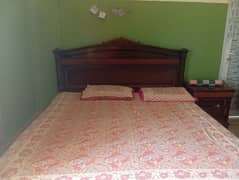 king sizebed with mattress and side table