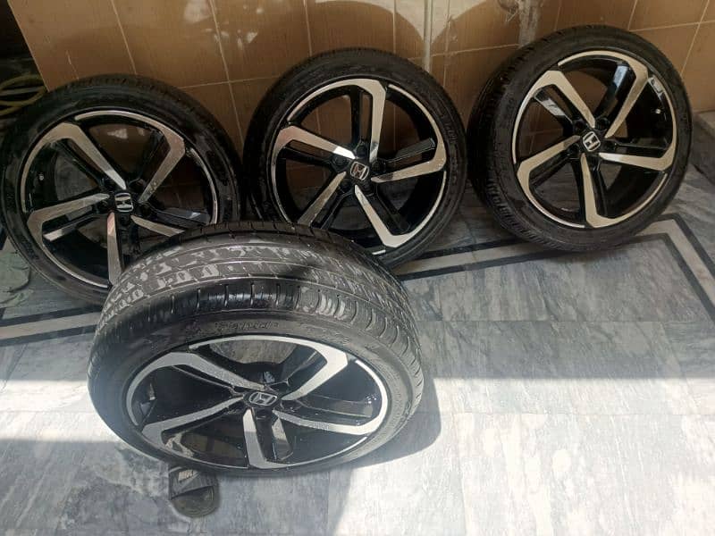 brand new 18 inch Honda rim and low profile tyres 1