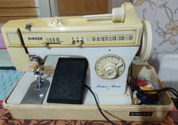 Singer sewing machine with all accsseries