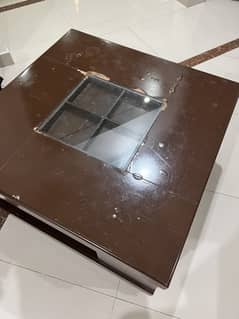 Wooden center table with center glass