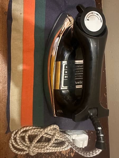 dawlance Dry Iron in 9 months warranty 1