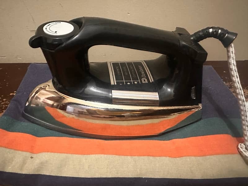 dawlance Dry Iron in 9 months warranty 4