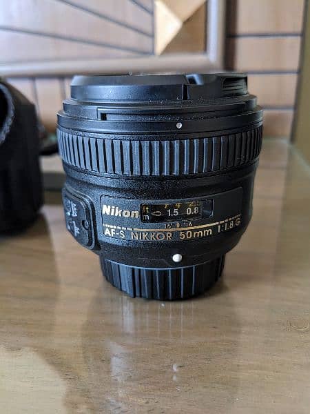 Nikon D5500 with Nikkor AF-S 50mm 1.8g and Nikkor AF-P 18-55mm DX VR 9