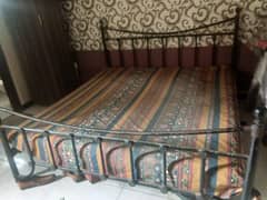 heavy rod iron bed with mattress